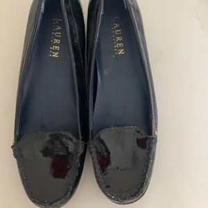 Ralph Lauren patent leather classic flats with slight lift.